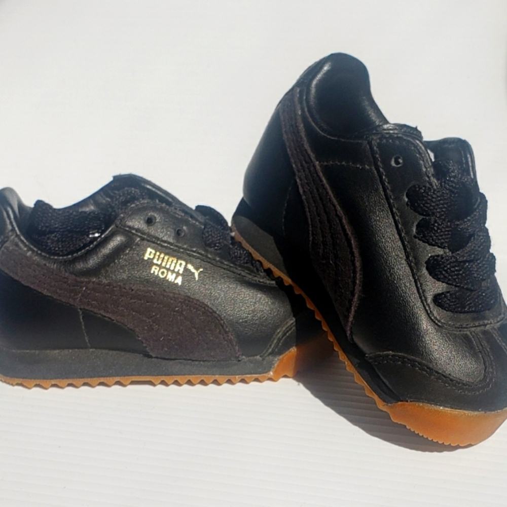Black Puma size 4